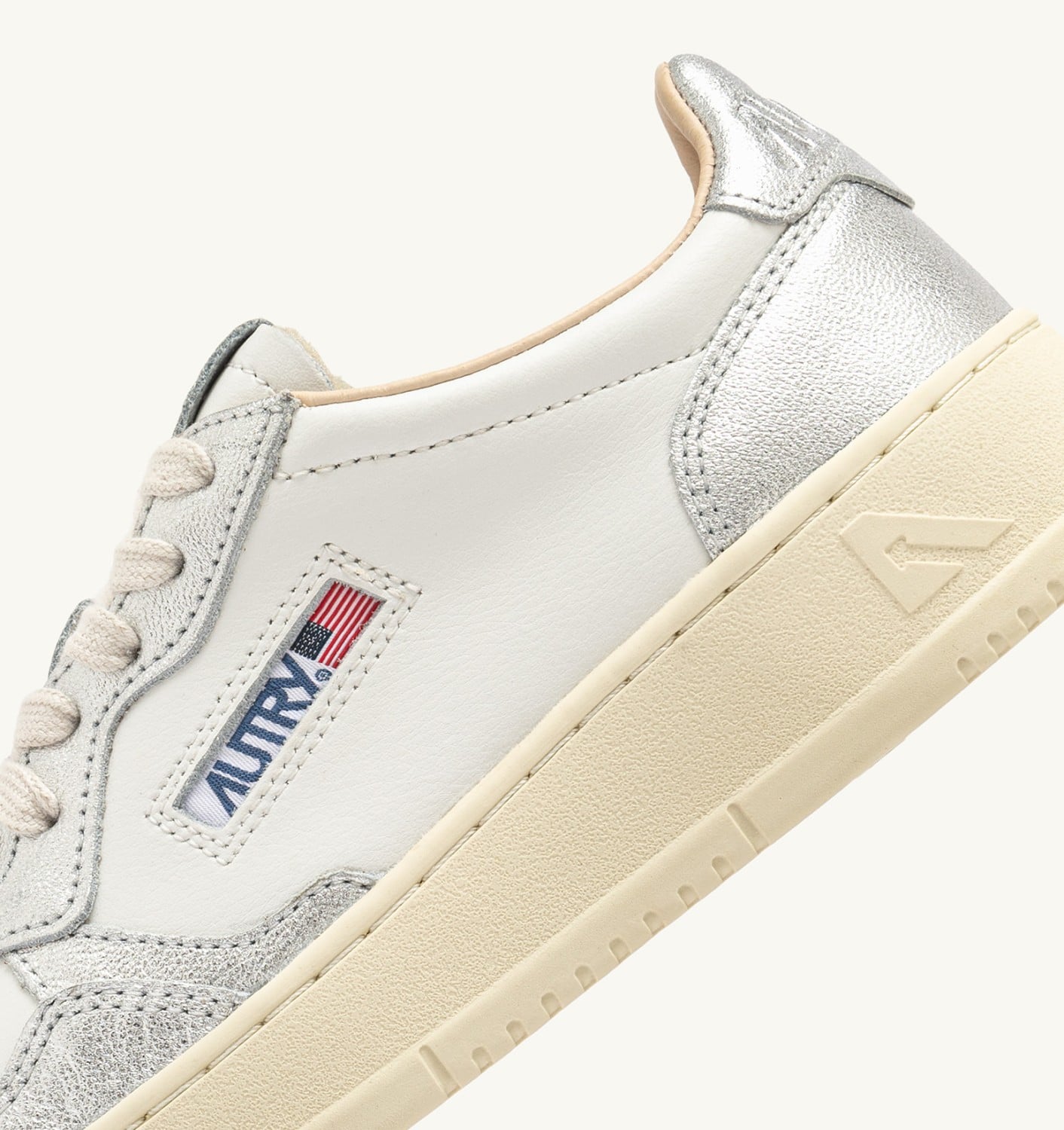 MEDALIST LOW BICOLOR IN PELLE BIANCA E METALLIZZATA ARGENTO