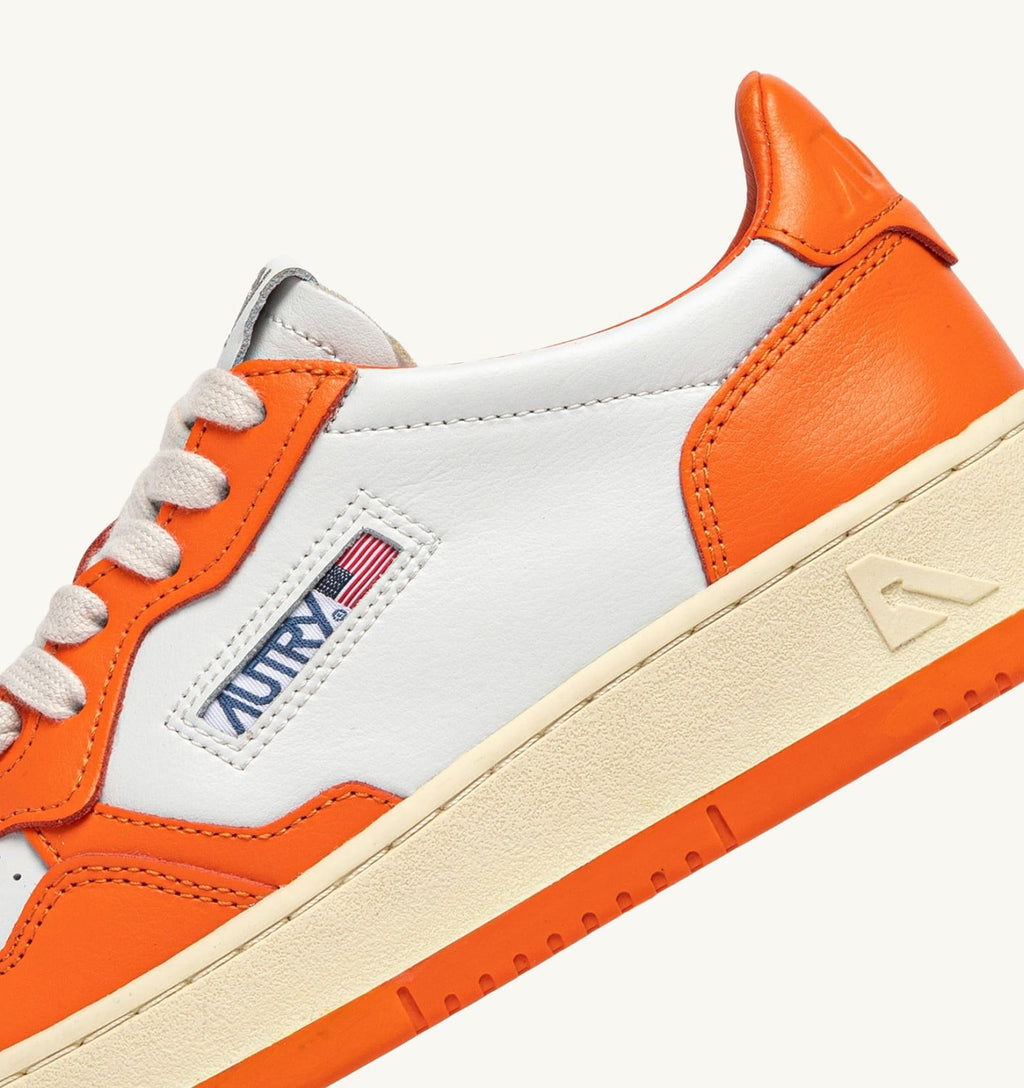 MEDALIST LOW BICOLOR IN PELLE BIANCA E PARSIMMON ORANGE DONNA