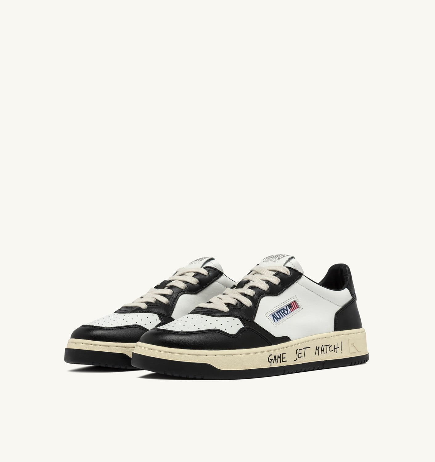 MEDALIST LOW IN PELLE BIANCA E NERA CON LETTERING UOMO