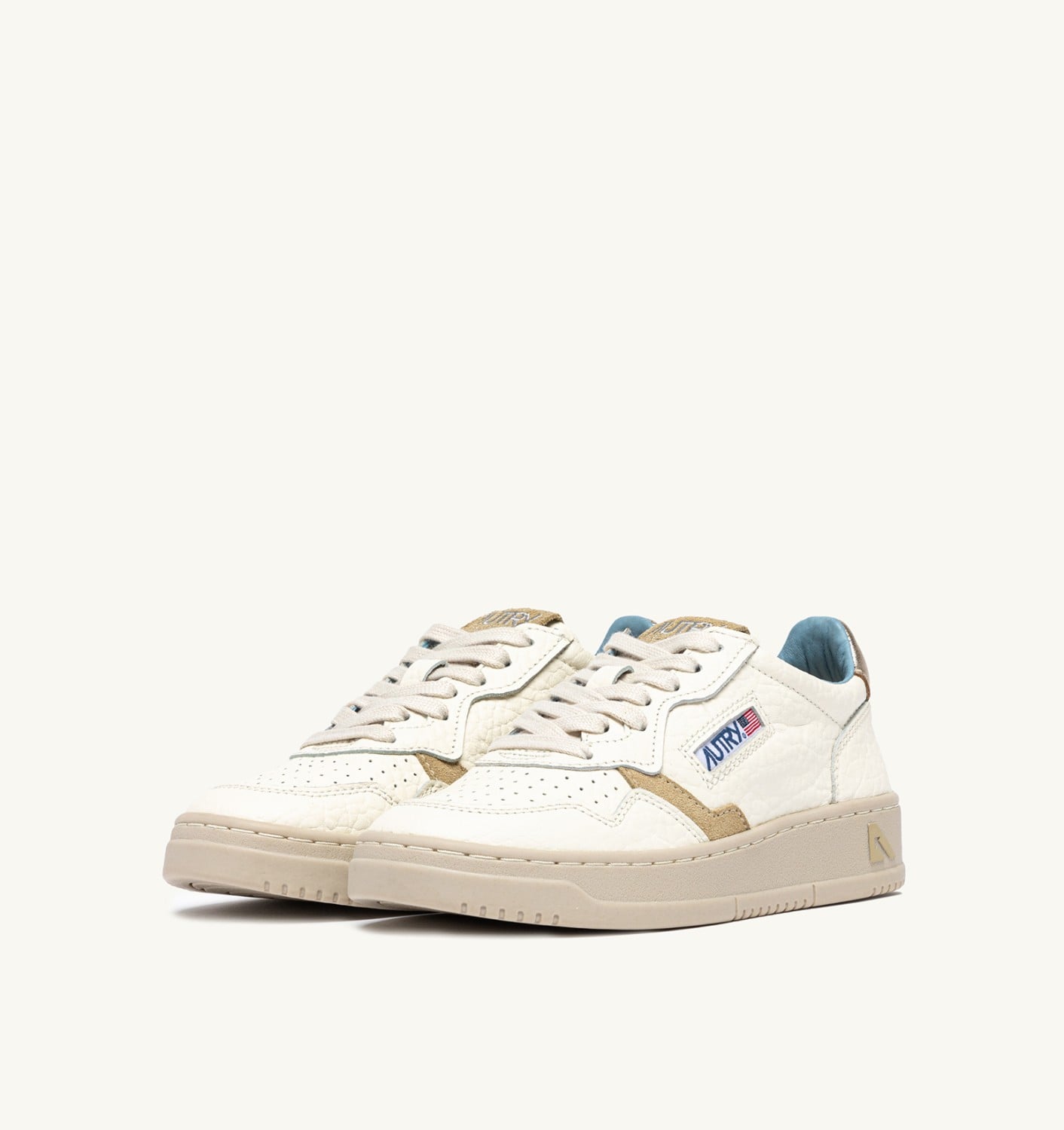 MEDALIST LOW IN PELLE PLATINO E SPONGE
