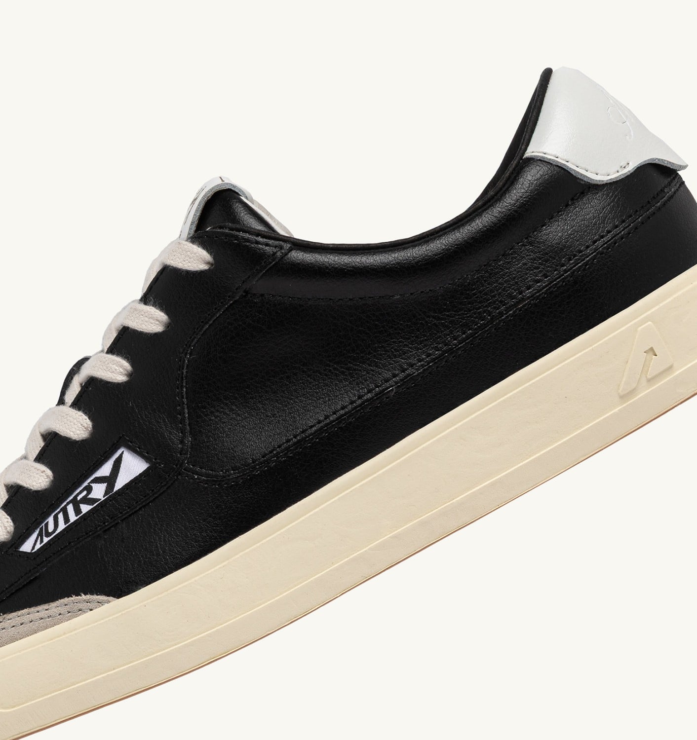 WINDSCAPE LOW IN PELLE NERA E BIANCA