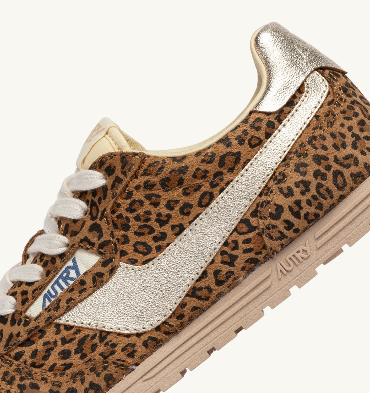 WINDSPIN IN SUEDE E PELLE LEOPARD E PLATINO